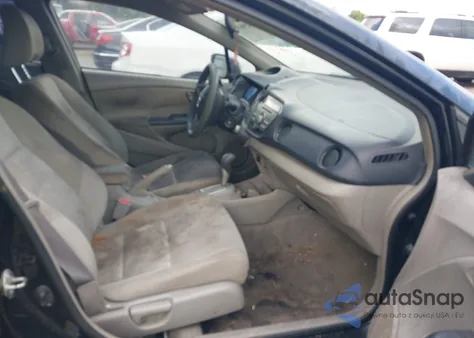 2010 Honda Insight Ex from USA, damaged, VIN JHMZE2H72AS013231